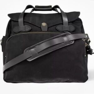 Filson black 235 Briefcase like new
16 ½"L x 7 ½"W x 14"H
Only used a few times